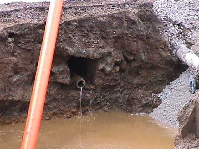 Two sources of sewage discharge beside Finnerty's shop